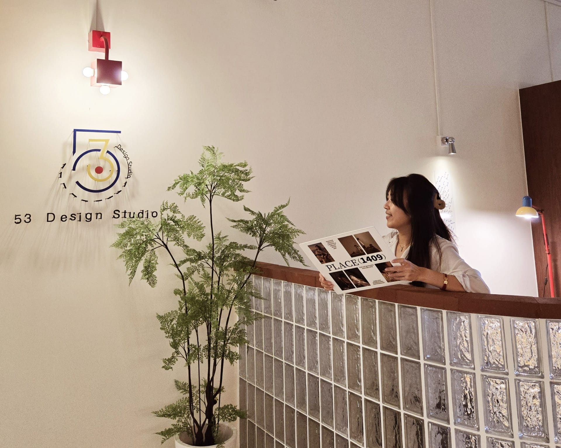 Lead designers Chai Hwa and Sandy reviewing materials at 53 Design Studio showroom